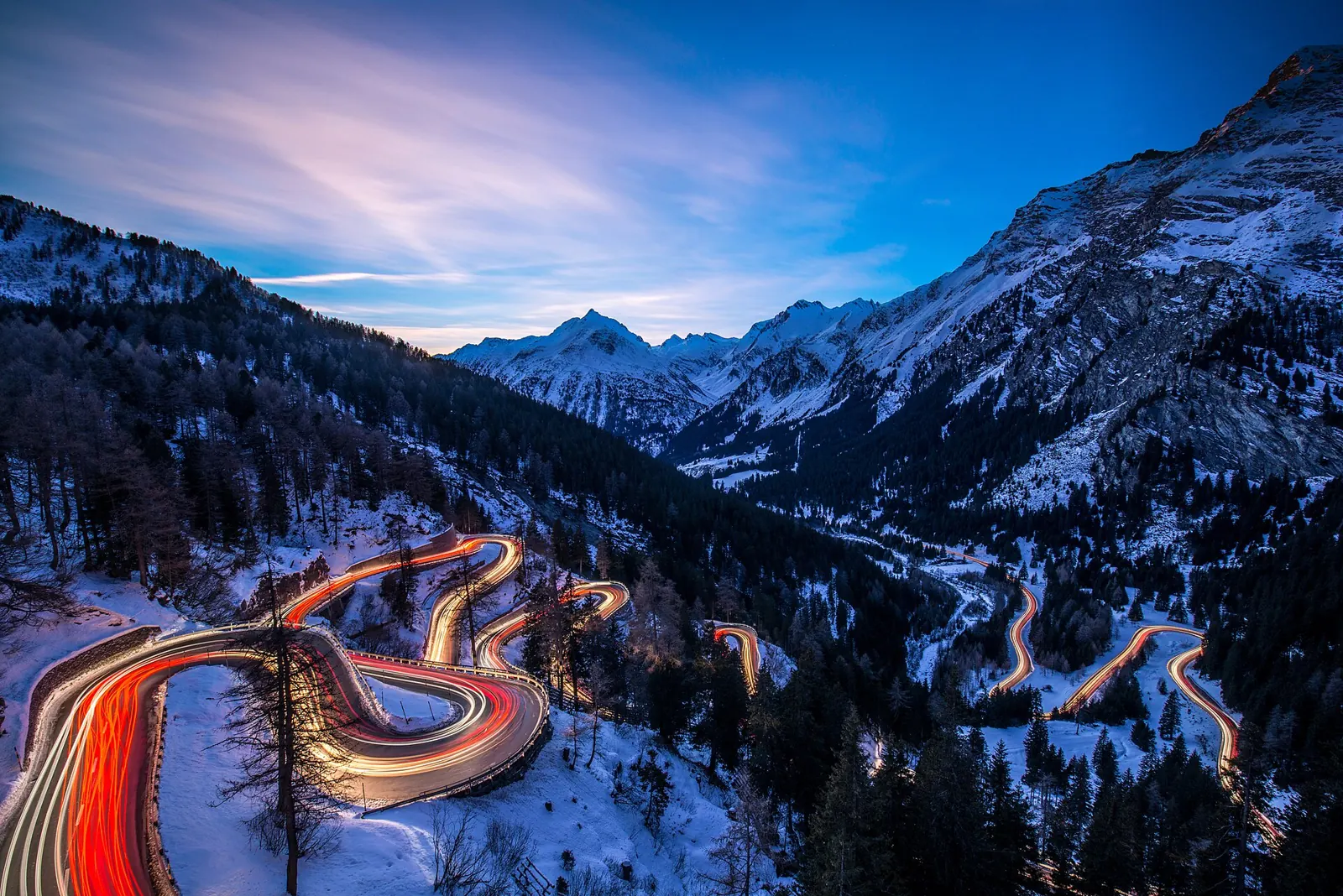 Maloja Pass road dropping from the Engadine toward Lake Como