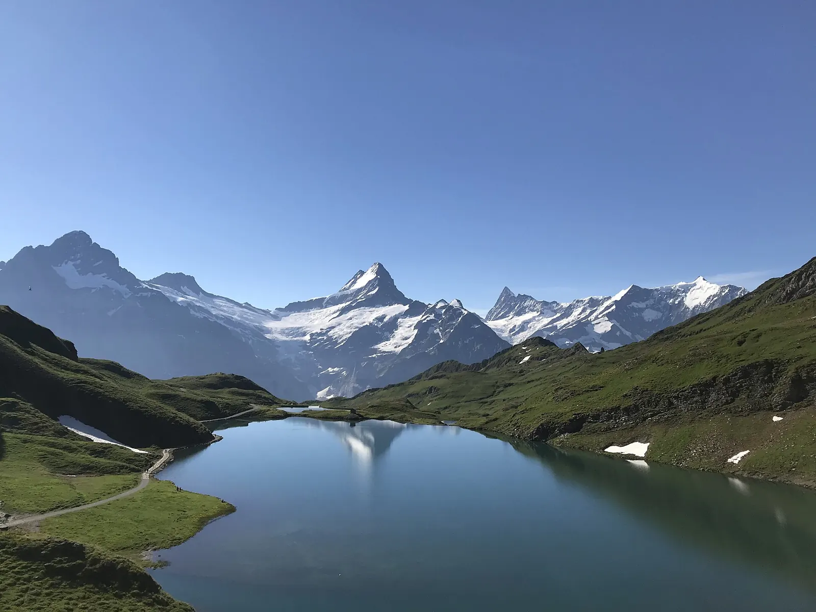 Bachalpsee lake reflecting the Bernese Alps above Grindelwald First