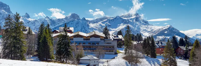 Villars-sur-Ollon in winter below the snowy Vaud Alps, a Magic Pass resort