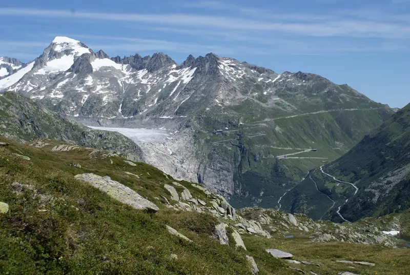 Hairpin bends of the Furka Pass road on a Swiss Alps road trip