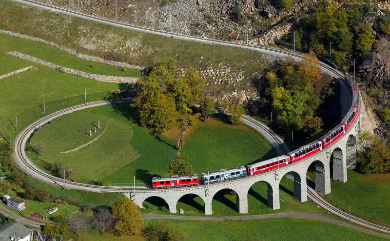A Rhaetian Railway train on the Brusio spiral viaduct, Bernina line