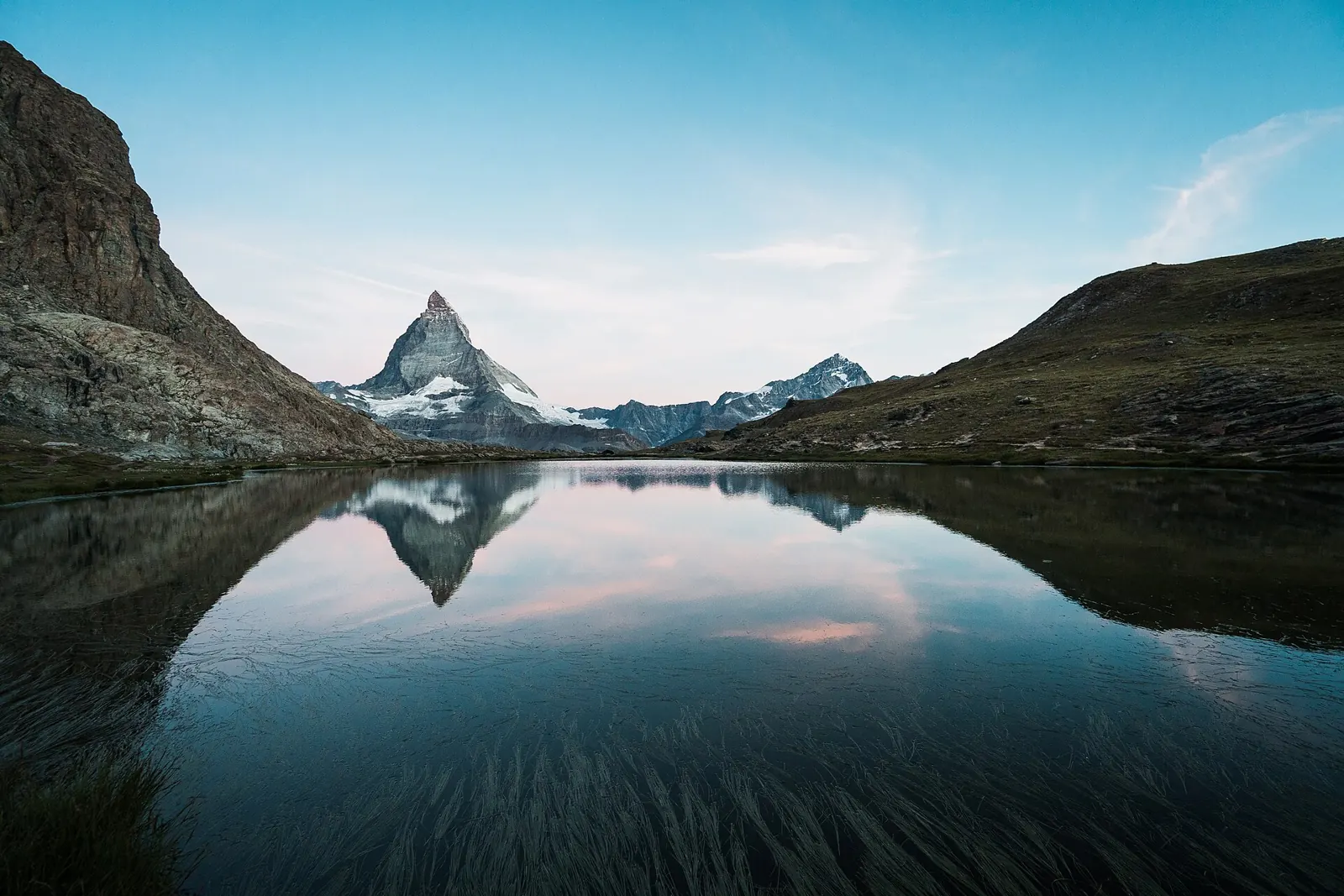 Things to do in Zermatt: the Matterhorn reflected in the Riffelsee