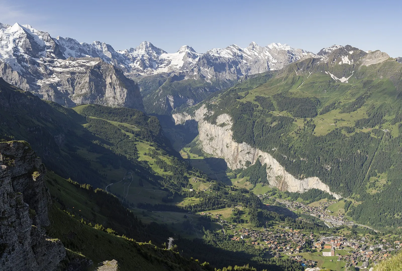 Wengen on its sunny shelf above the Lauterbrunnen valley, below the Jungfrau massif